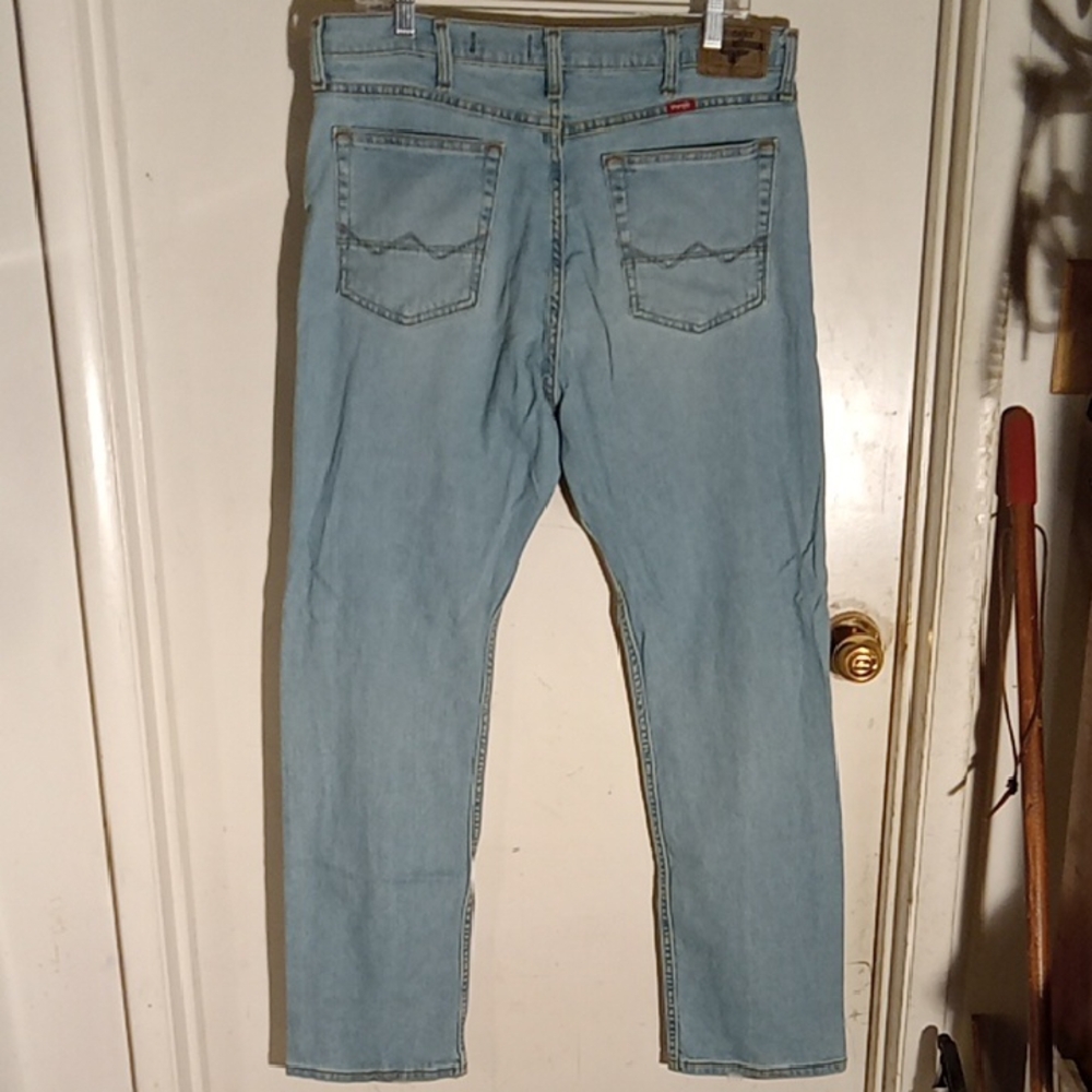 Men's Wranglers Light Blue Worn Distressed But Still Have A Lot Of Life To Live